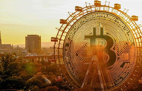 Prater mit Riesenrad, die Mitte des Riesenrades ist mit einer Bitcoin-Münze ausgefüllt